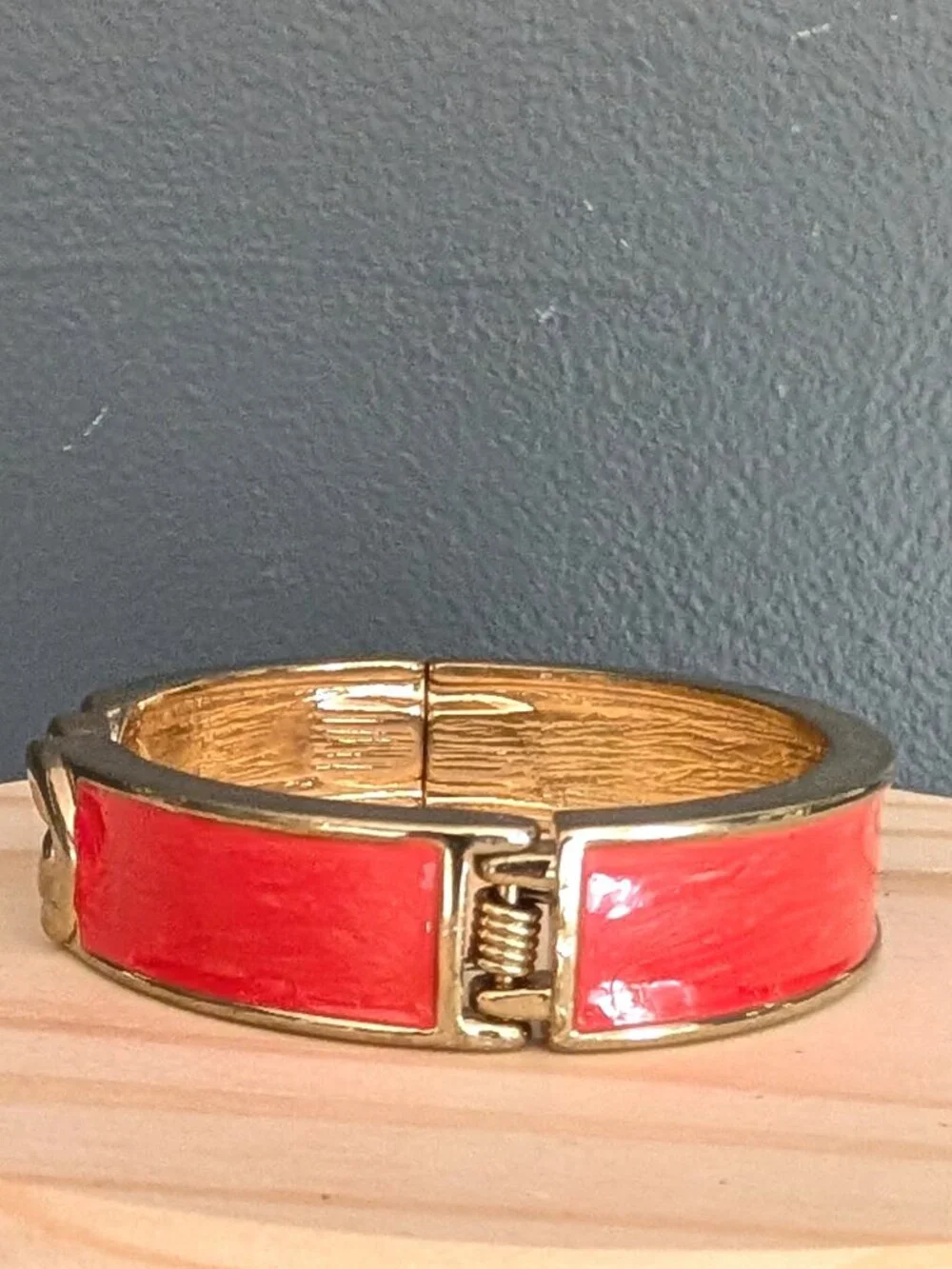 Gold and orange enamel bangle